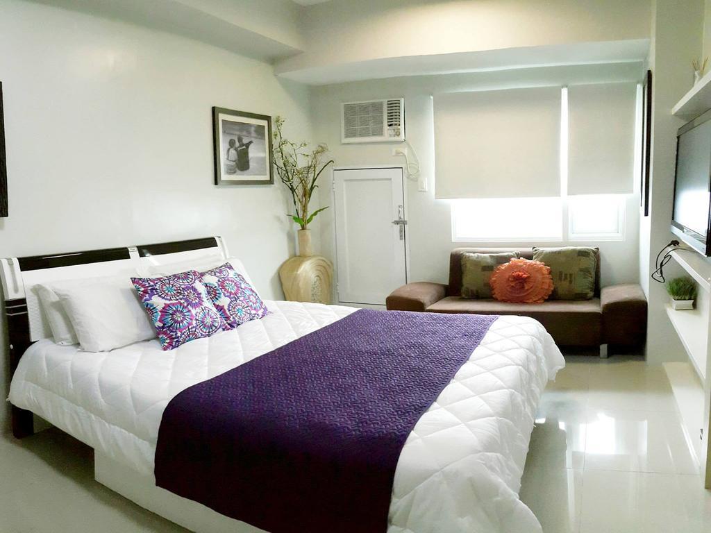 Grass Residences By Jg Vacation Rentals Quezon City Room photo